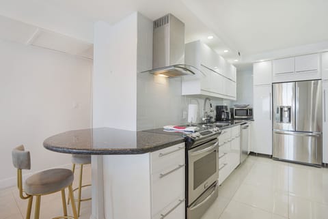 Deluxe Apartment, 2 Bedrooms, Non Smoking, Ocean View | Private kitchen | Full-size fridge, microwave, oven, stovetop