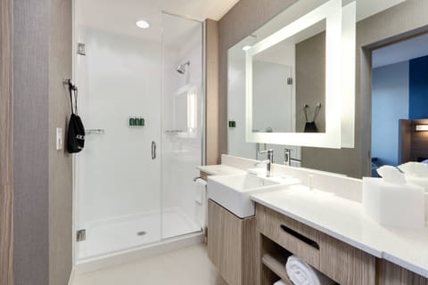 Suite, 1 King Bed | Bathroom | Hair dryer, towels