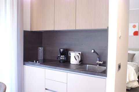 Apartment, 1 Bedroom (Peonia) | Private kitchenette | Full-size fridge, microwave, stovetop, espresso maker