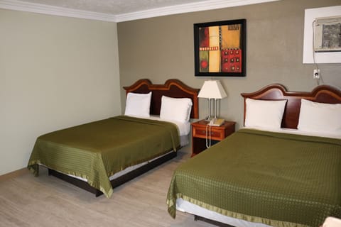 Deluxe Room, 2 Queen Beds | Iron/ironing board, free WiFi, bed sheets