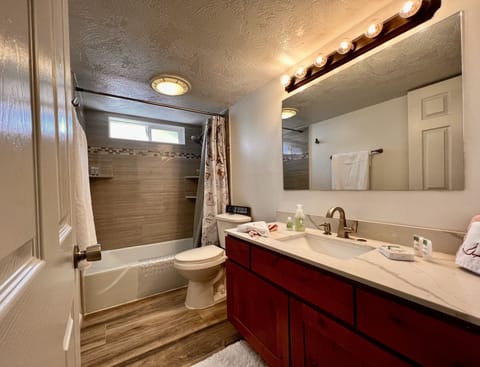 Business Condo, Multiple Bedrooms | Bathroom | Deep soaking tub, rainfall showerhead, designer toiletries, hair dryer
