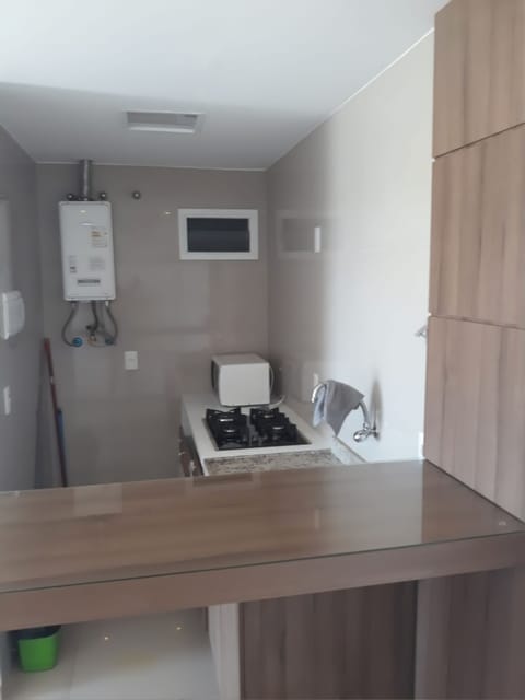 Standard Apartment, 1 Bedroom, Sea View | Private kitchen | Fridge, stovetop, cookware/dishes/utensils, dining tables