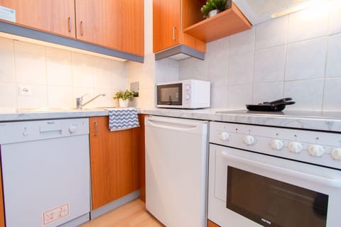 Design Apartment | Private kitchen | Full-size fridge, microwave, stovetop, dishwasher