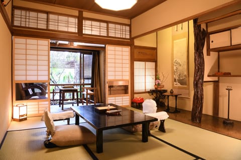 Standard Room, Multiple Beds, Private Bathroom (6-8 Tatami Mats) | Down comforters, in-room safe, individually decorated