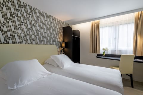 Basic Twin Room, 2 Twin Beds | Premium bedding, individually decorated, individually furnished, desk