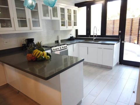Wait until you see how the kitchen opens to the back patio