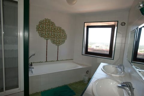 Double Room (Arum) | Bathroom | Hair dryer, towels, soap, toilet paper