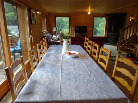 dining table seats 12 people, sliding doors to balcony