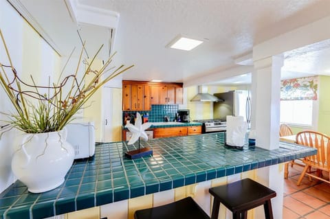 breakfast bar with 3 stools