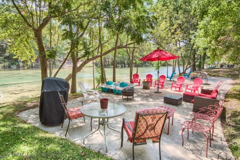 Concrete pad at the waters edge with ample seating, propane grill, and direct river access.
Paddle Boat was swept away in flood, no longer available.