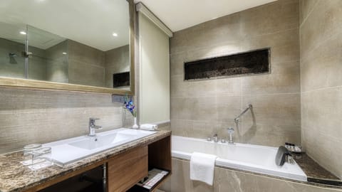 Executive Suite, 1 Queen Bed | Bathroom | Designer toiletries, hair dryer, slippers, bidet