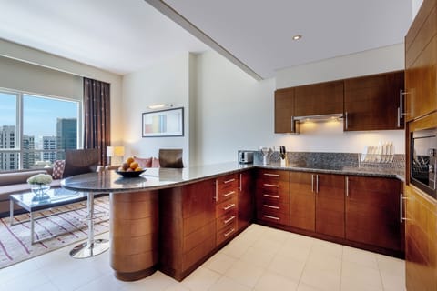 Executive One Bedroom Apartment | Living area | Smart TV, video-game console, DVD player, iPod dock