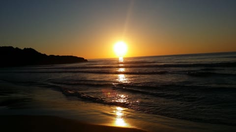 On the beach, white sand