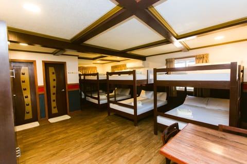 Barkada Room for 14 persons | Desk, bed sheets