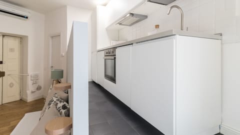Apartment (0 Bedroom) | Private kitchen | Full-size fridge, oven, electric kettle, highchair