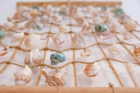 A close-up of a decorative item, possibly a tray with small figurines or trinkets. The detail adds a personal touch to the decor.
