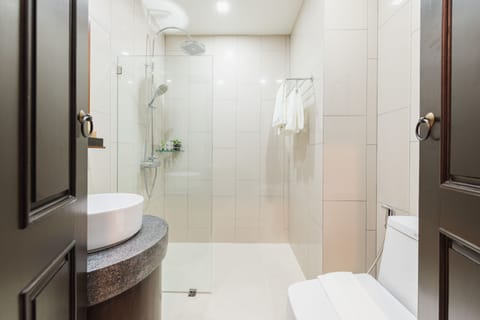 Lanna Standard Room | Bathroom | Designer toiletries, hair dryer, bathrobes, slippers