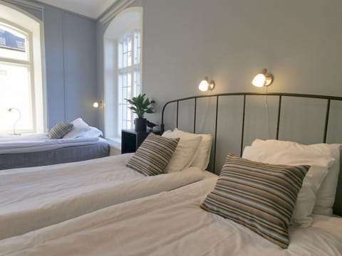 Family Room (5 adults) | 1 bedroom, blackout drapes, free WiFi, bed sheets