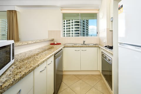 One Bedroom Apartment | Private kitchenette | Full-size fridge, microwave, oven, stovetop