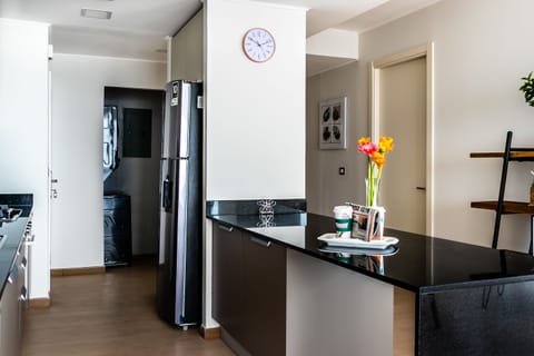 Deluxe Apartment, 3 Bedrooms | Private kitchen | Full-size fridge, microwave, oven, stovetop