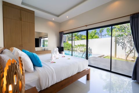 Pool Suite Villa 3 Bedrooms | Minibar, in-room safe, individually decorated, blackout drapes
