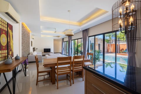 Garden Pool Villa | Living room | 49-inch LCD TV with cable channels, TV