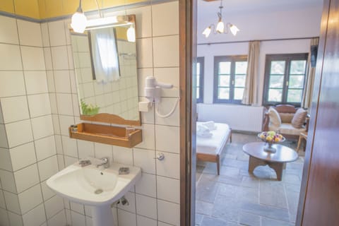 Double Room, Garden View | Bathroom | Combined shower/tub, hair dryer, towels, soap