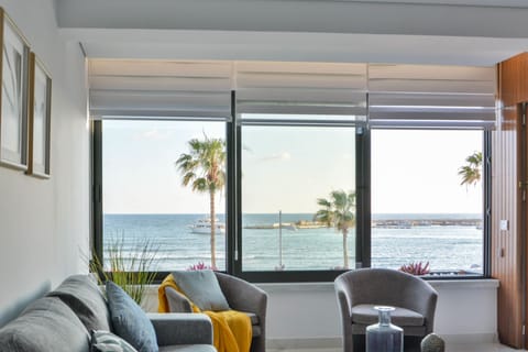 Luxury Apartment, Sea View | Living room | 43-inch flat-screen TV with cable channels, TV