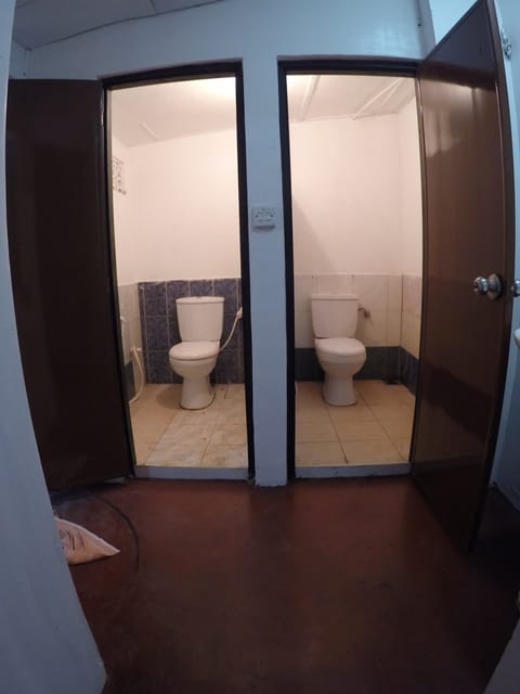 Basic Shared Dormitory | Bathroom | Shower, hydromassage showerhead, hair dryer, bidet