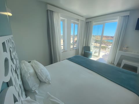 Double Room, Terrace, Sea View | Minibar, blackout drapes, iron/ironing board, free WiFi