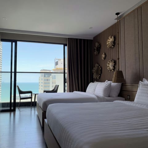 Family Partial Sea View with Balcony | Minibar, in-room safe, desk, blackout drapes