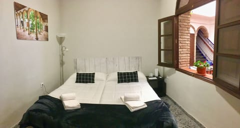 Double Room, Shared Bathroom | Down comforters, iron/ironing board, free WiFi, bed sheets