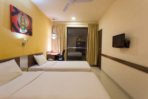 Standard Double Room | Minibar, in-room safe, desk, iron/ironing board