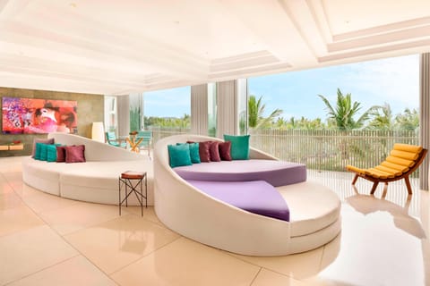 Suite, 2 Bedrooms, Balcony, Ocean View (Wow Suite) | Living room | LED TV, DVD player, iPod dock