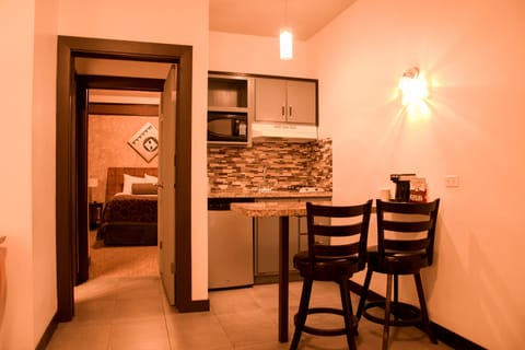 Luxury Suite, 1 Double Bed with Sofa bed, Kitchenette | Private kitchen | Coffee/tea maker