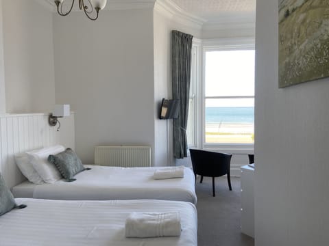 Comfort Double or Twin Room, Sea View | Individually furnished, iron/ironing board, bed sheets