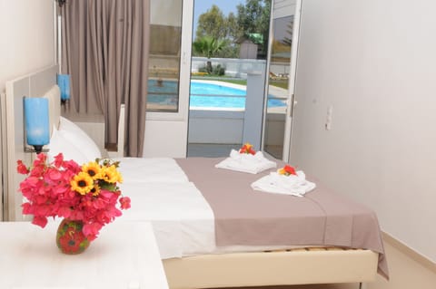 Superior Studio (Side Pool View) | In-room safe, desk, iron/ironing board, free cribs/infant beds