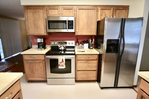 Good sized kitchen with plenty of counter space and stainless steel appliances.