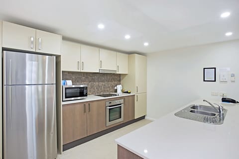 Standard Apartment, 3 Bedrooms | Private kitchen | Fridge, microwave, stovetop, dishwasher