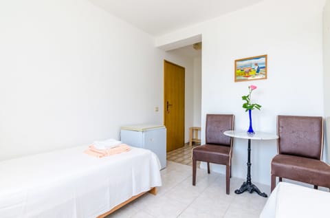 Twin Room, Patio, Garden View | Individually decorated, individually furnished, free WiFi, bed sheets