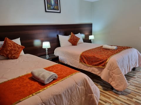 Family Triple Room | Hypo-allergenic bedding, down comforters, desk, free WiFi