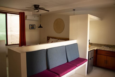 Deluxe Room, 1 King Bed, Pool View | In-room safe, iron/ironing board, free cribs/infant beds, rollaway beds