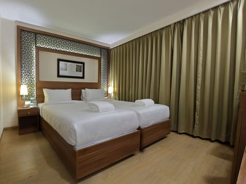 Executive Room | Premium bedding, down comforters, minibar, in-room safe