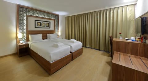 Club Room | Premium bedding, down comforters, minibar, in-room safe