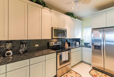 Swept Away In Ground Floor | Private kitchen | Full-size fridge, microwave, oven, stovetop