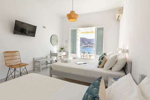 Standard Triple Room, Sea View | Premium bedding, in-room safe, individually decorated