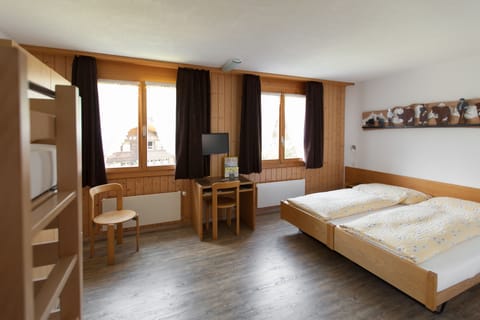 Quadruple Room, Multiple Beds, Non Smoking | In-room safe, desk, soundproofing, free WiFi