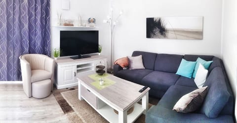 Marina Müritz Apartment | Living area | TV