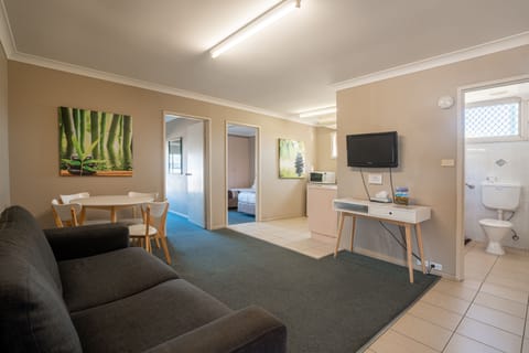 Standard Suite, 2 Bedrooms, Non Smoking, Kitchenette (Unit) | Living area | Flat-screen TV