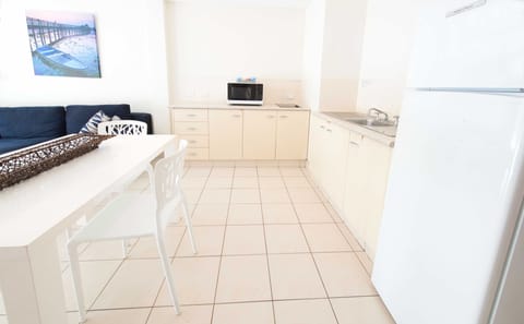 Townhouse, 2 Bedrooms | Private kitchen | Full-size fridge, microwave, stovetop, coffee/tea maker